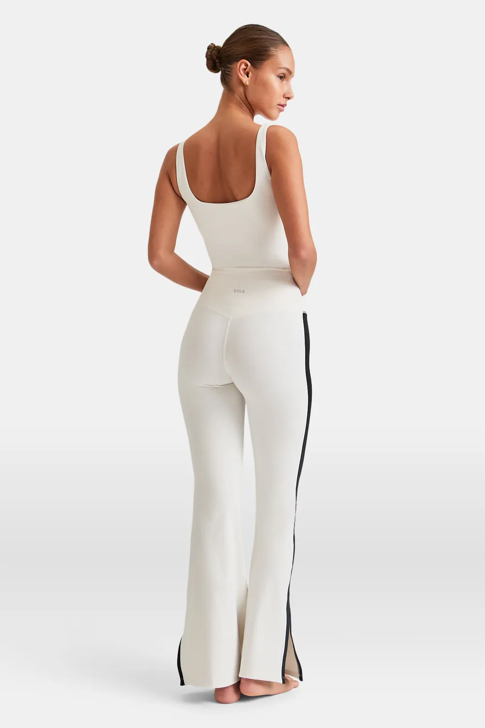 DAYFLEX CONTRAST STRIPE SIDE SPLIT FLARED YOGA PANT NO FRONT SEAM - IVORY AND SHADOW BLACK